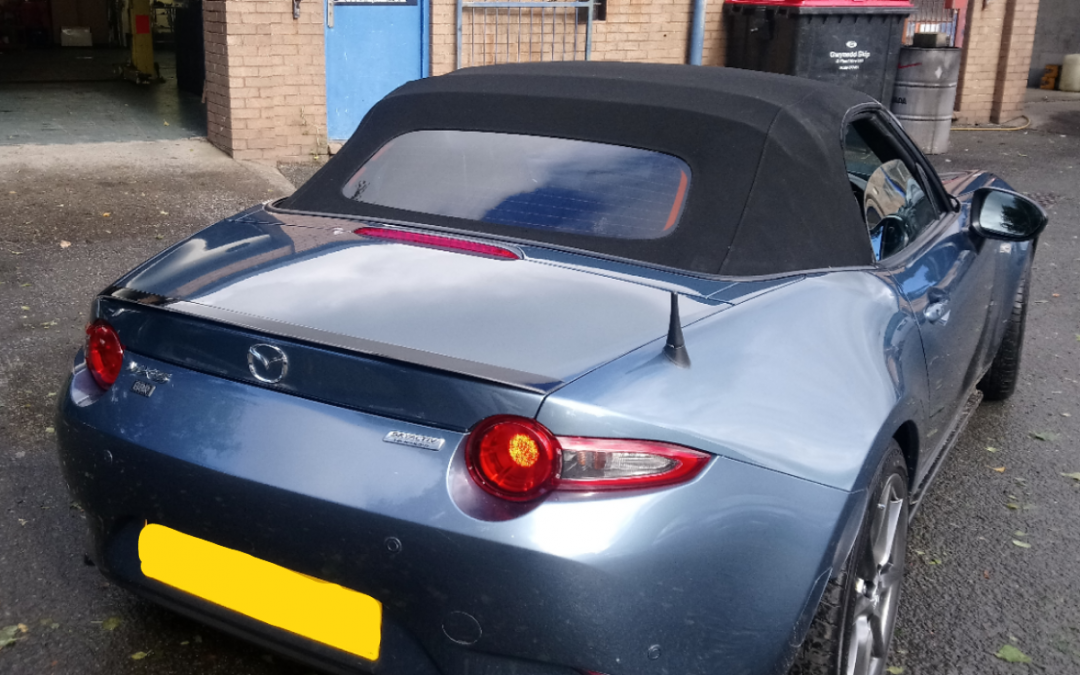 Mazda MX 5 with rear screen tinted.